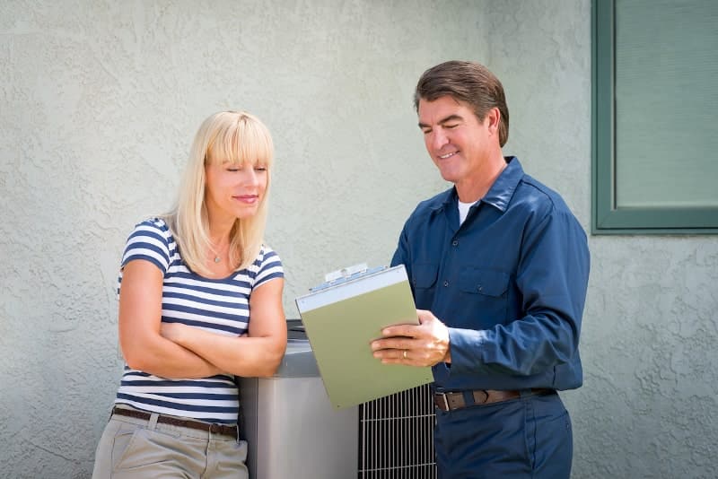 woman speaking to contractor